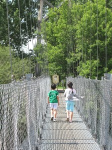 kids walking on bridge